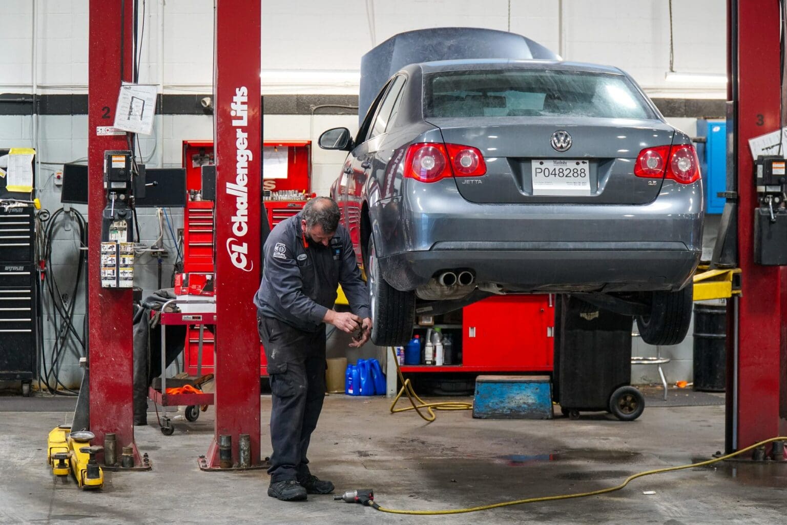 Mechanic servicing a vehicle